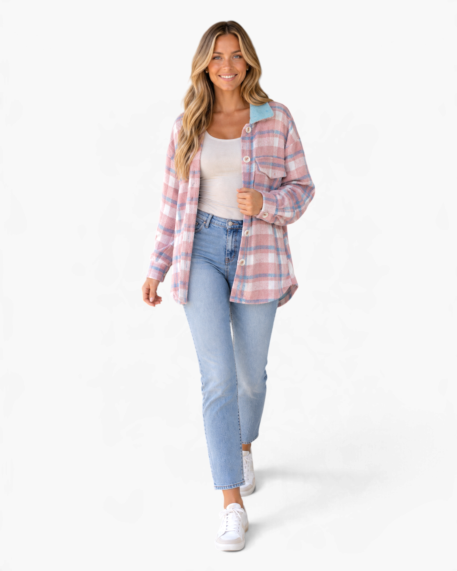 Beach Rose Co. pink and blue plaid shacket with a cream sherpa collar, worn by a smiling model with jeans and sneakers