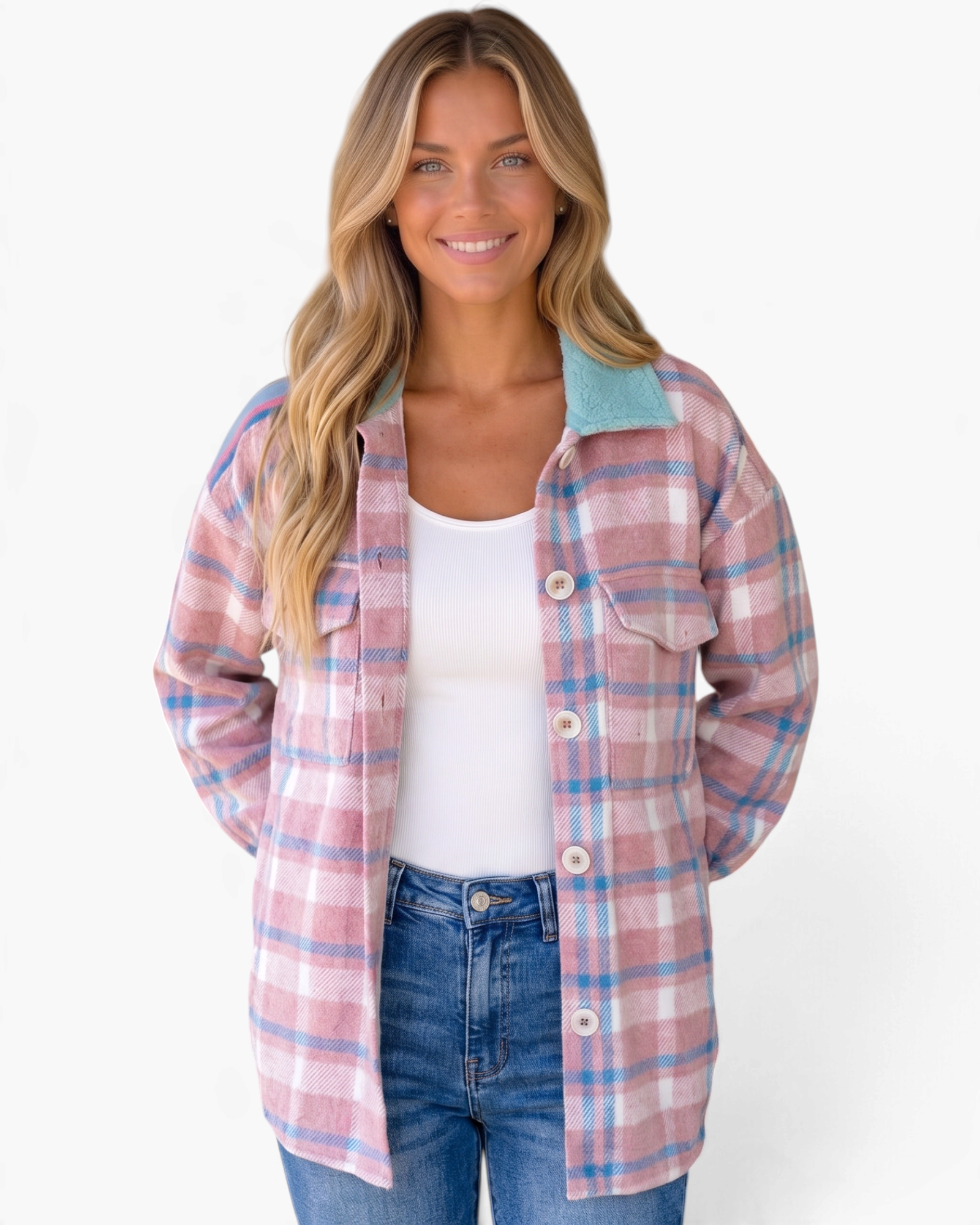 Beach Rose Co. pink and blue plaid shacket with a contrasting sherpa collar worn by a smiling woman
