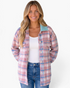 Beach Rose Co. pink and blue plaid shacket with a contrasting sherpa collar worn by a smiling woman