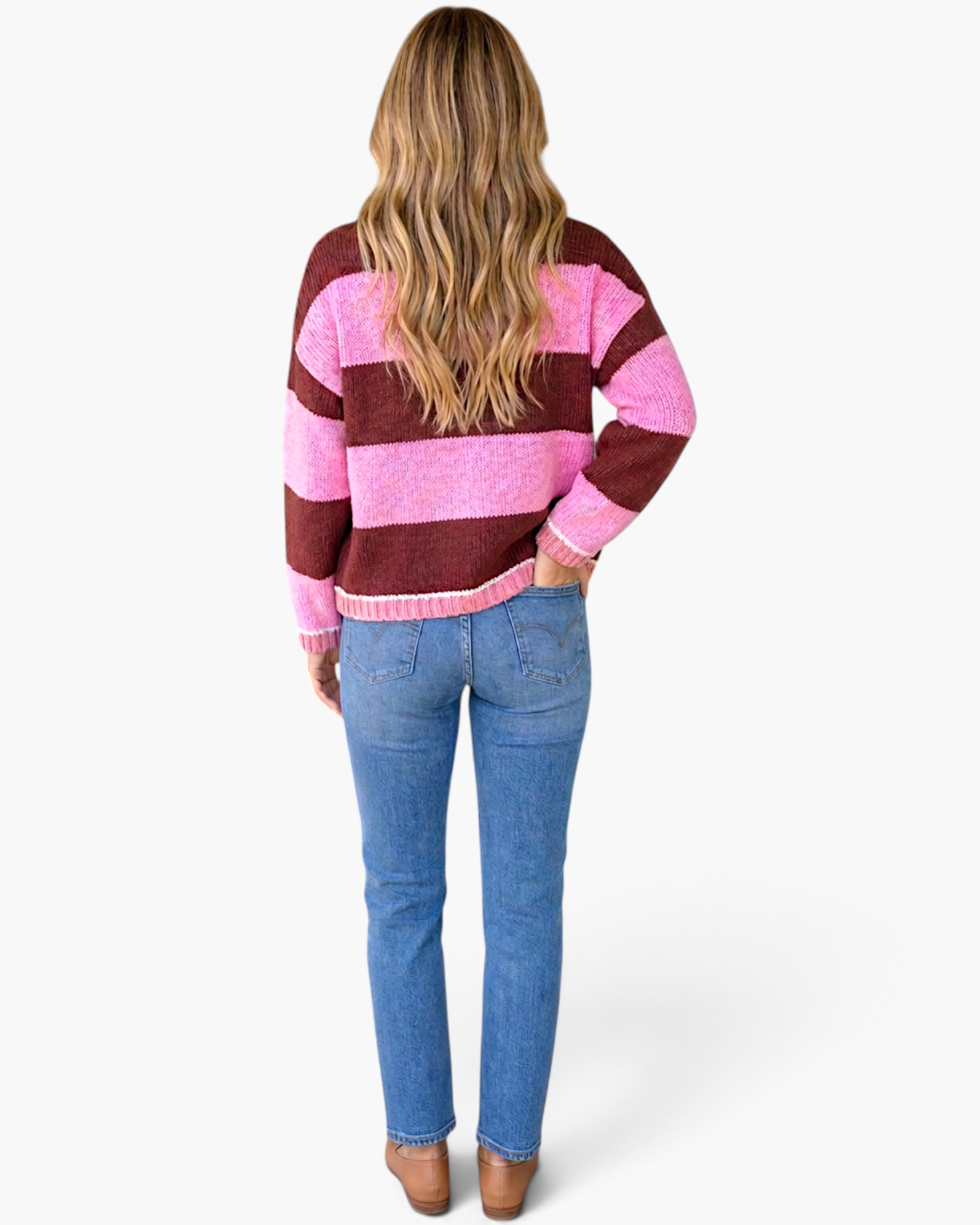 Beach Rose Co. Hana Fit knit sweater with pink and brown stripes, round neck, and drop shoulders, worn with jeans.