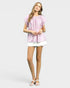 Beach Rose Co. pink floral puff sleeve blouse with gathered neckline and back keyhole detail. Made of rayon and nylon.
