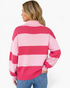 Beach Rose Co. pink and fuchsia striped half-zip sweater with balloon sleeves and ribbed collar, back view.