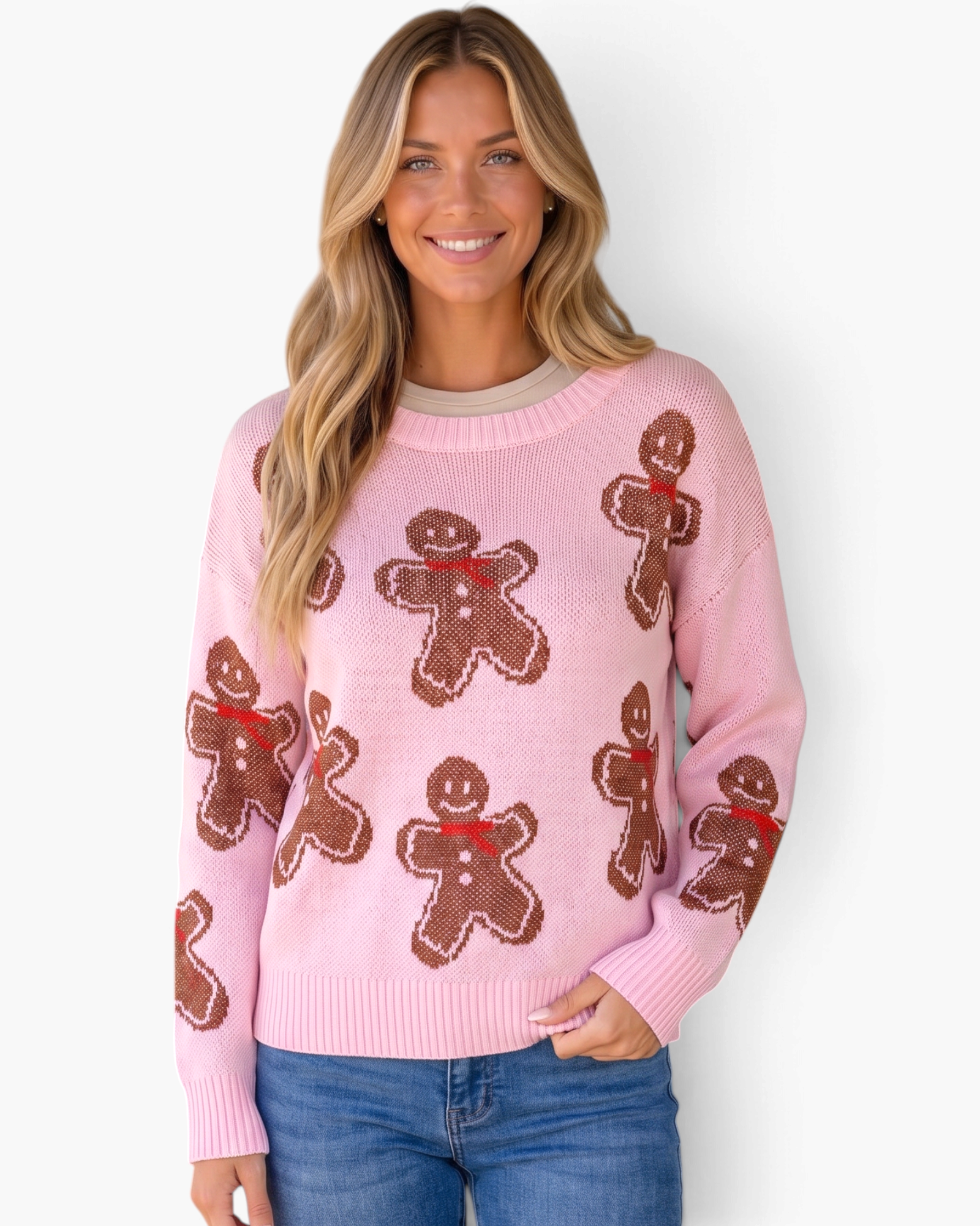 Beach Rose Co. pink crewneck sweater featuring an allover brown gingerbread man pattern with red scarf details.