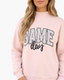 Beach Rose Co. light pink baggy sweatshirt with mock neck and GAME DAY polka dot graphic print