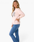 Beach Rose Co. light pink baggy sweatshirt with polka dot graphic text, round neck, and long sleeves on a model