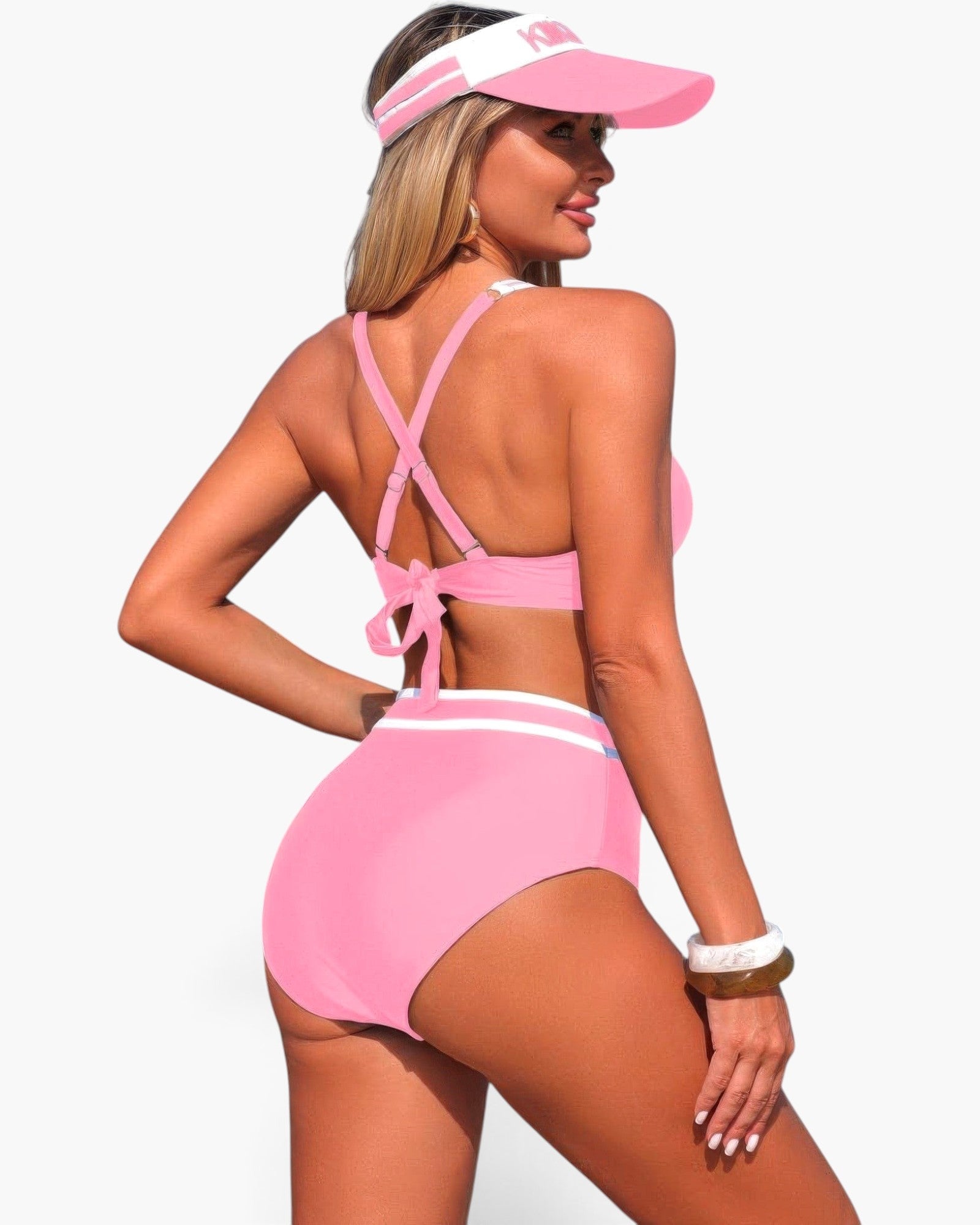 Beach Rose Co. pink high-waisted bikini with cross-back straps and white contrasting trim worn by a blonde model.