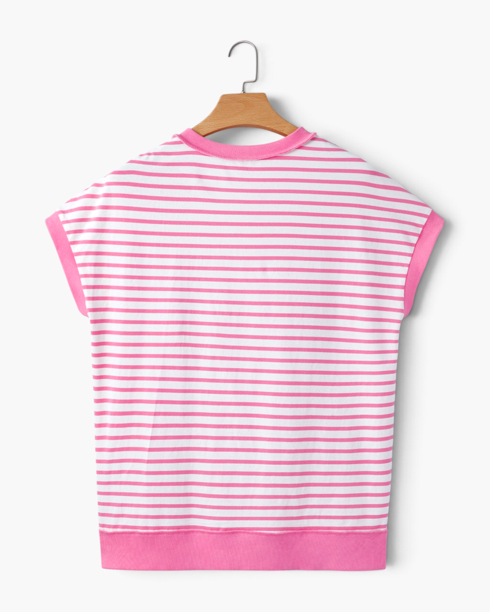 Beach Rose Co. pink and ivory horizontal striped cotton blend top with contrast trim, back view on a wooden hanger.