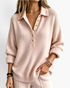 Beach Rose Co. relaxed light pink knit sweater with a collared button placket, dropped shoulders, and ribbed trim.