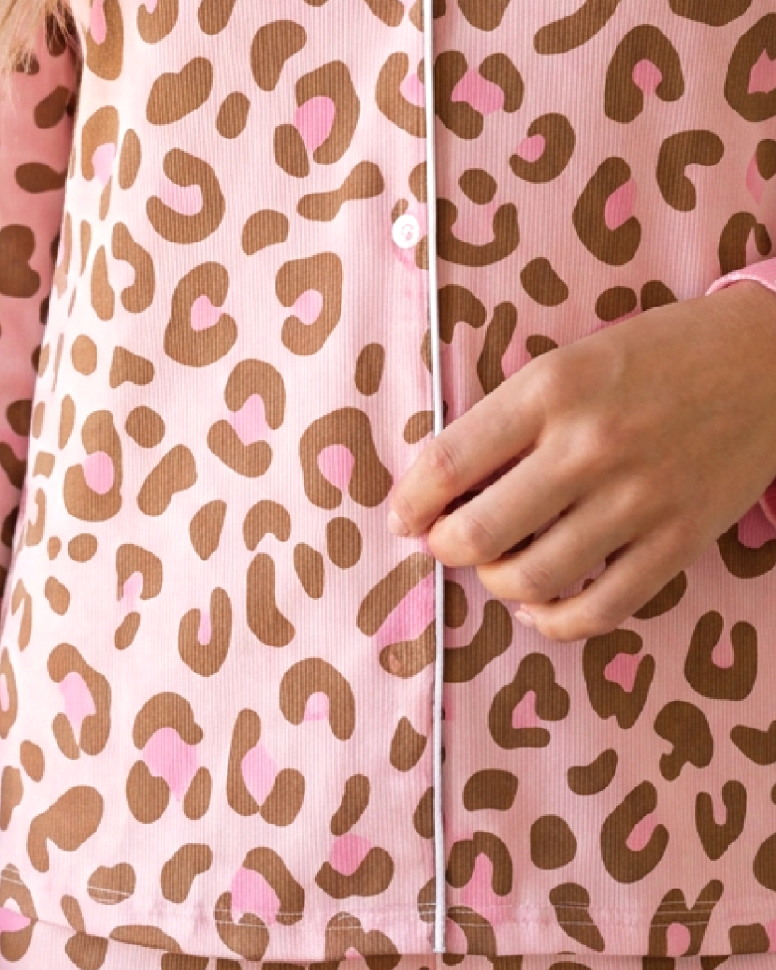 Beach Rose Co. pink leopard print button-front pajama top with contrasting white piping detail
