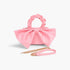Beach Rose Co. pink nylon clutch with a large front bow, ruched top handle, and detachable gold chain strap.