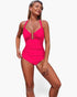 Beach Rose Co. hot pink one-piece swimsuit with V-neck, U-ring detail, and high-waisted silhouette on a model