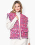 Beach Rose Co. pink plaid tweed vest with frayed raw edges and decorative button flap pockets worn over a white sweater