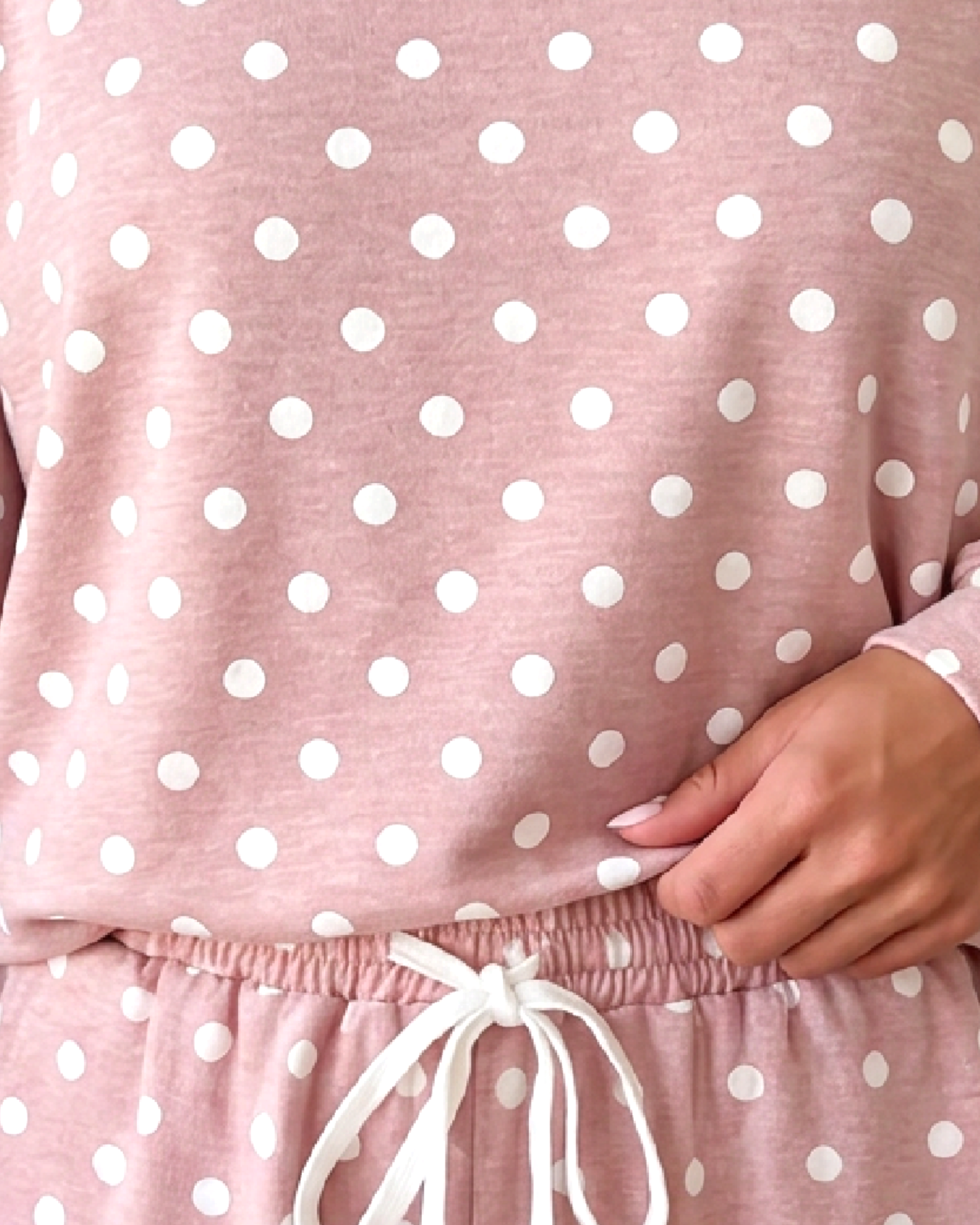 Beach Rose Co. dusty pink lounge set featuring a long sleeve top and drawstring shorts with a white polka dot print.