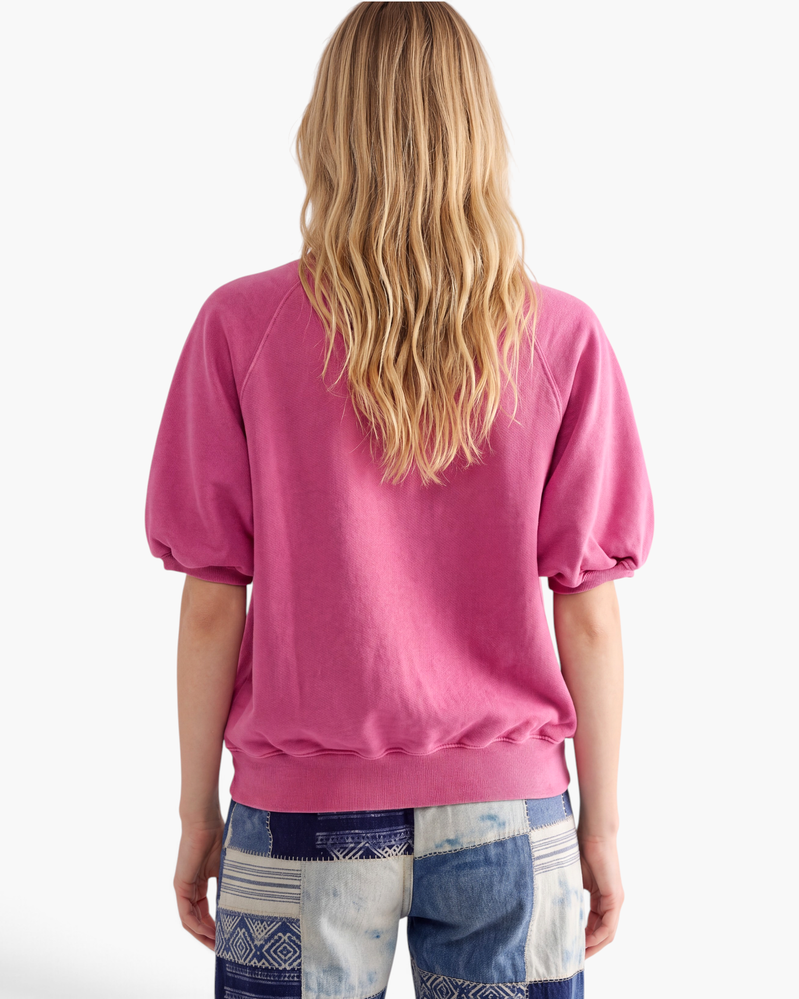 Beach Rose Co. pink polyester sweatshirt with elbow-length puff sleeves and raglan seams, back view.