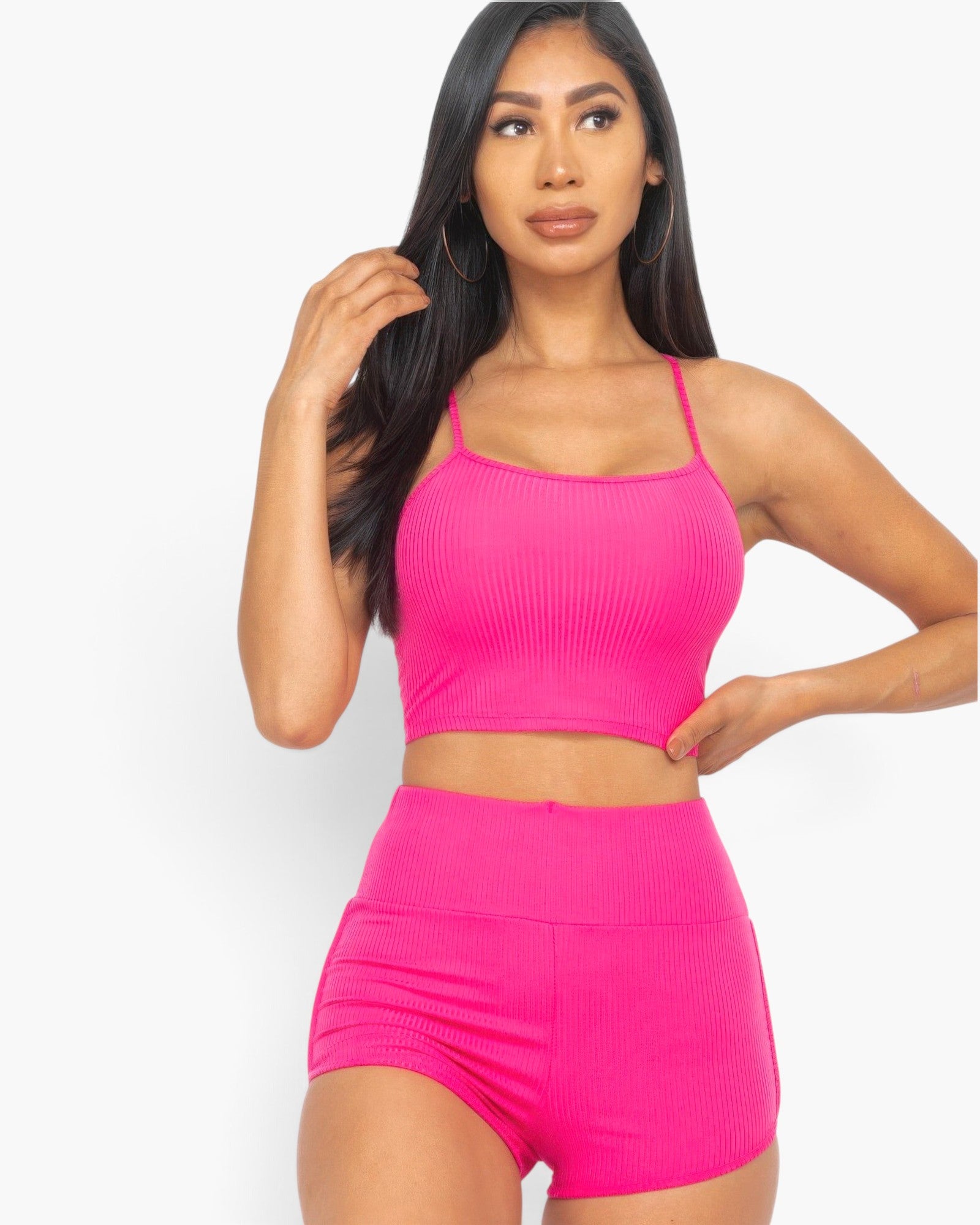 Beach Rose Co. berry pink ribbed cami crop top and matching ruched shorts set worn by a model.