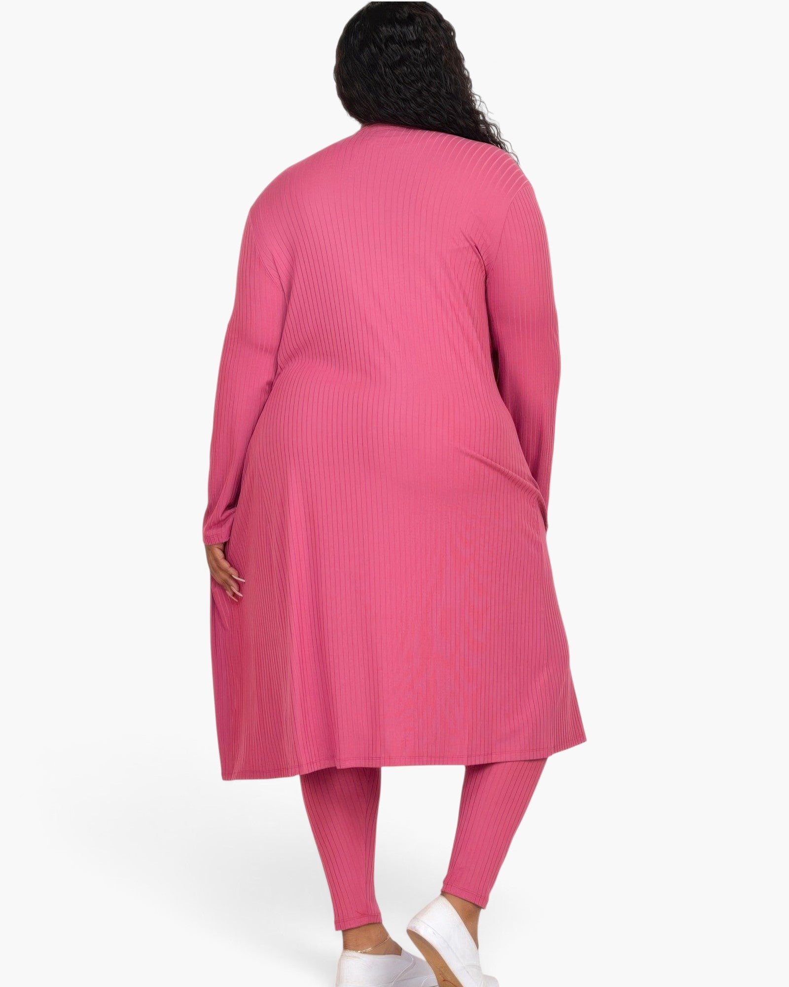 Beach Rose Co. plus size pink ribbed long cardigan and leggings set worn by a model from the back view