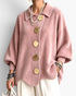 Beach Rose Co. pink ribbed knit cardigan with balloon sleeves, oversized gold buttons, collar, and scalloped hem.