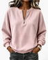 Beach Rose Co. light pink ribbed quarter-zip pullover with dropped shoulders and banded cuffs worn with dark jeans.