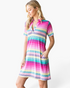 Beach Rose Co. pink multi-stripe shift dress with a notched neckline, short sleeves, and side pockets on a model.