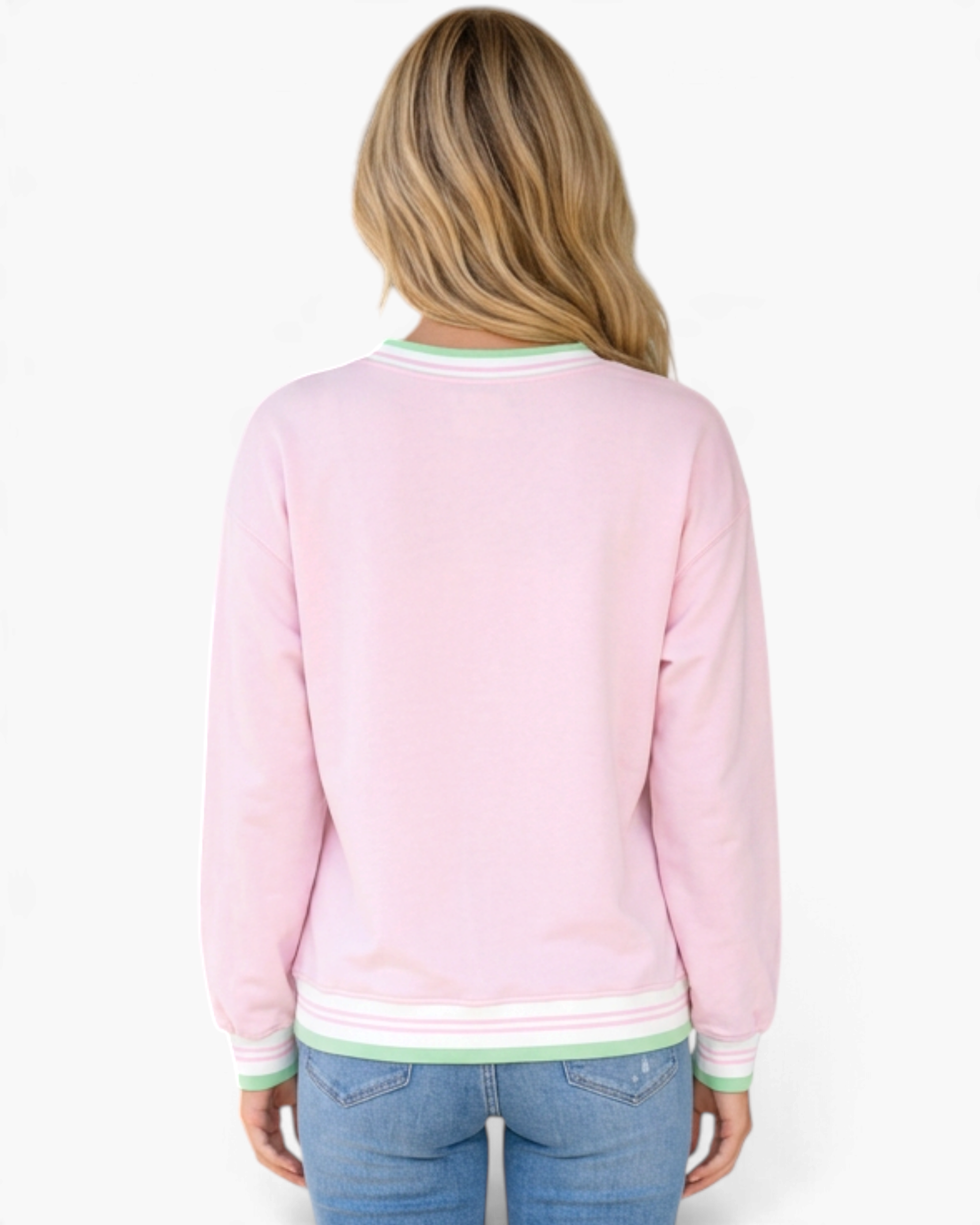 Beach Rose Co. pink sweatshirt with green and white striped trim on cuffs and hem, shown from the back on a model.