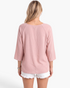 Back view of a Beach Rose Co. pink textured polyester blouse with three-quarter sleeves and a relaxed fit.