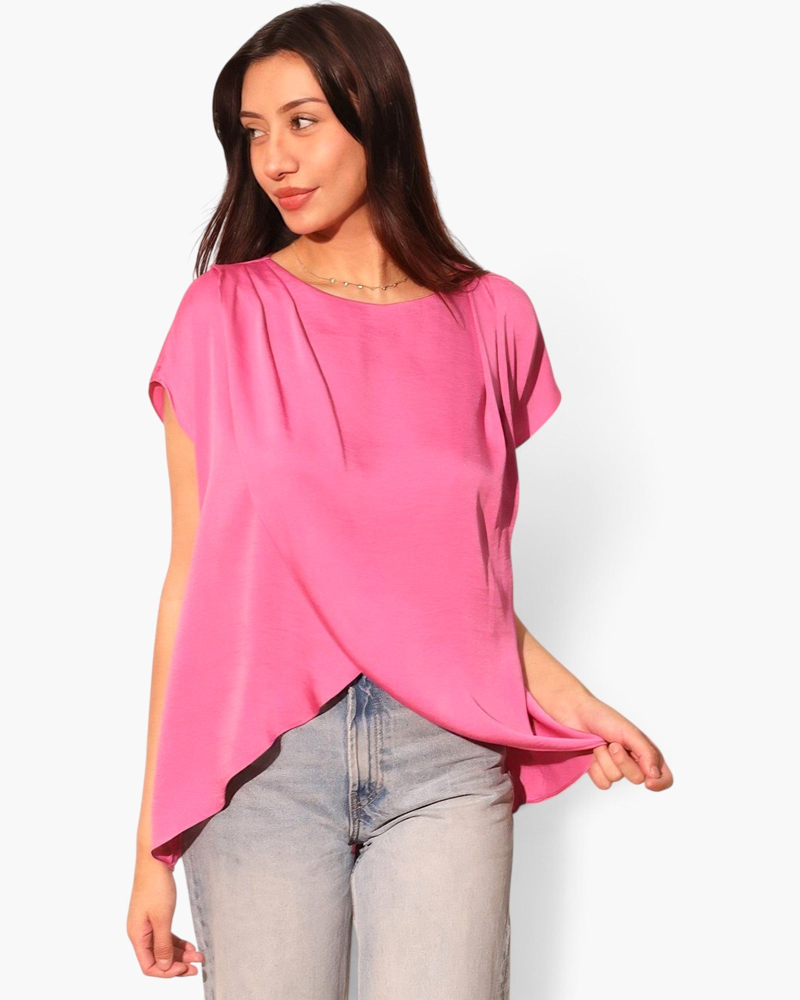 Beach Rose Co. pink washed poly silk tulip tunic top with a fluid drape and relaxed fit worn with denim jeans