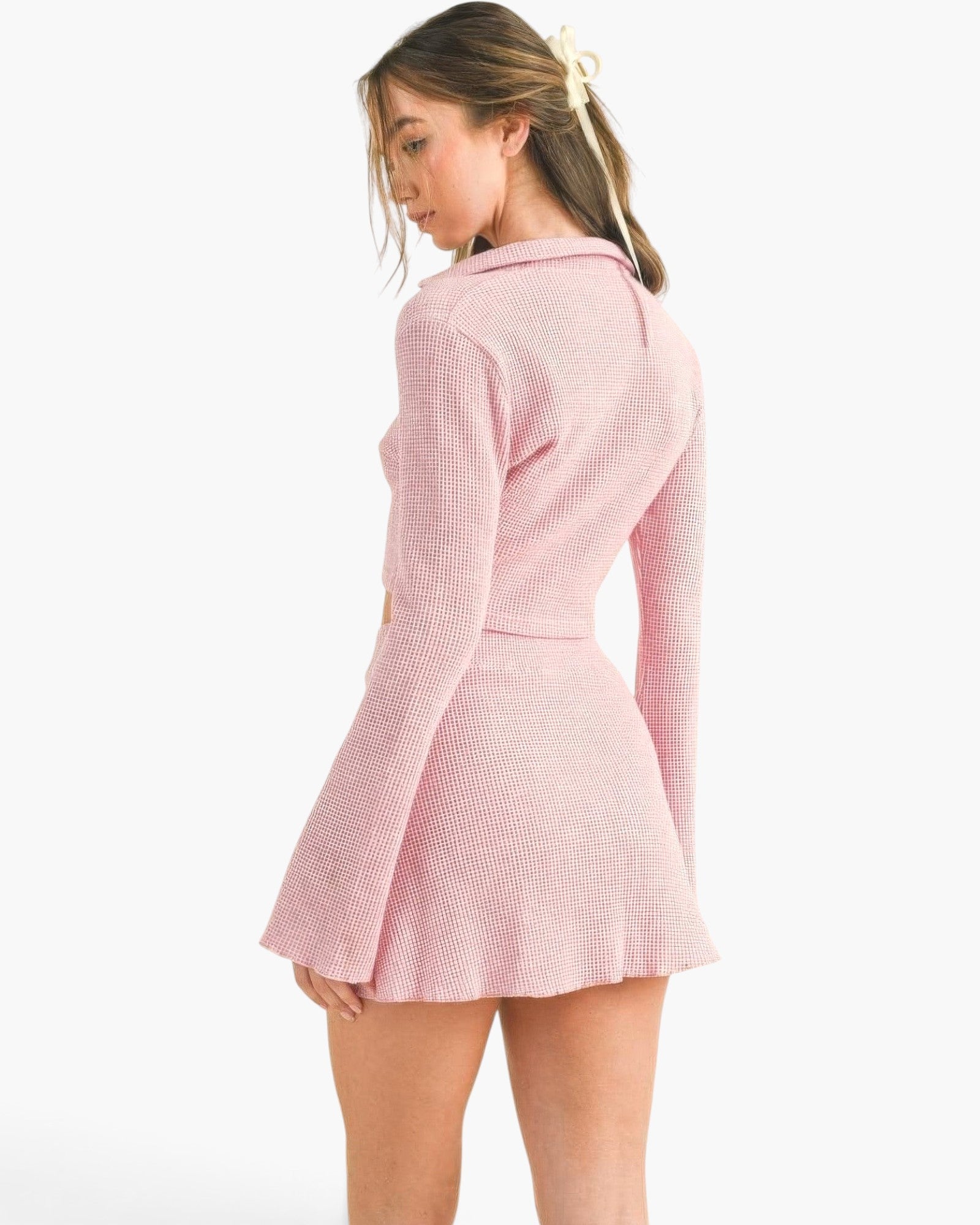 Beach Rose Co. pink waffle knit two-piece set featuring a collared bell sleeve top and matching mini skirt.