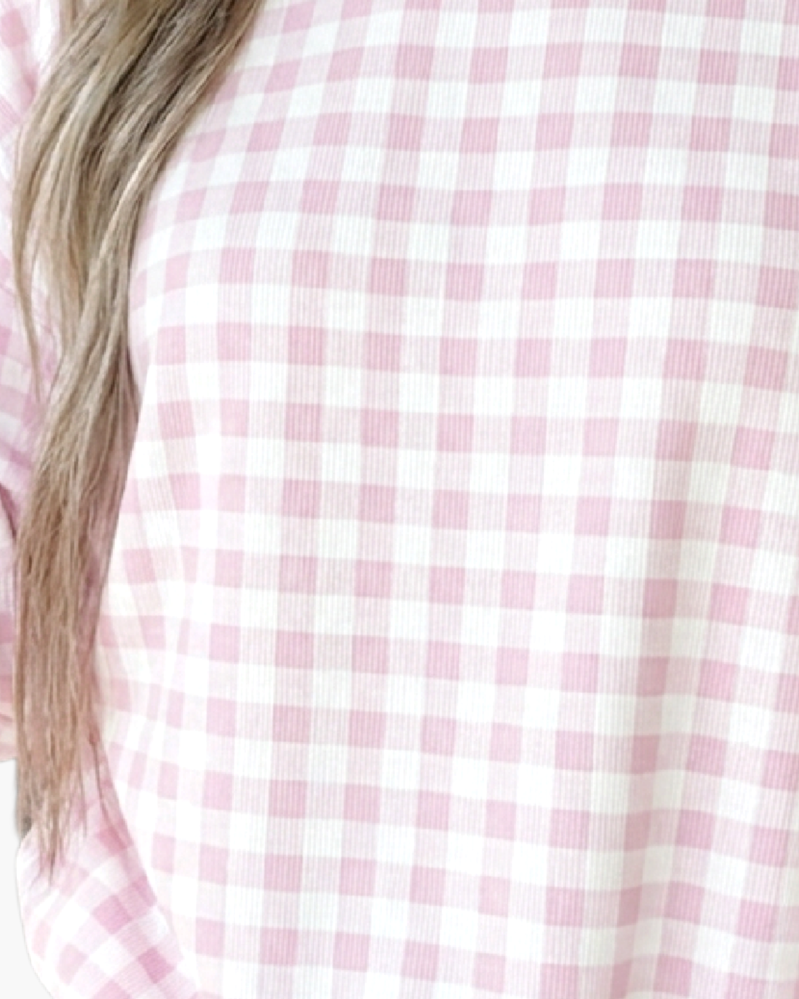 Beach Rose Co. pink and white gingham sweatshirt featuring a close-up of the soft polyester check pattern fabric.