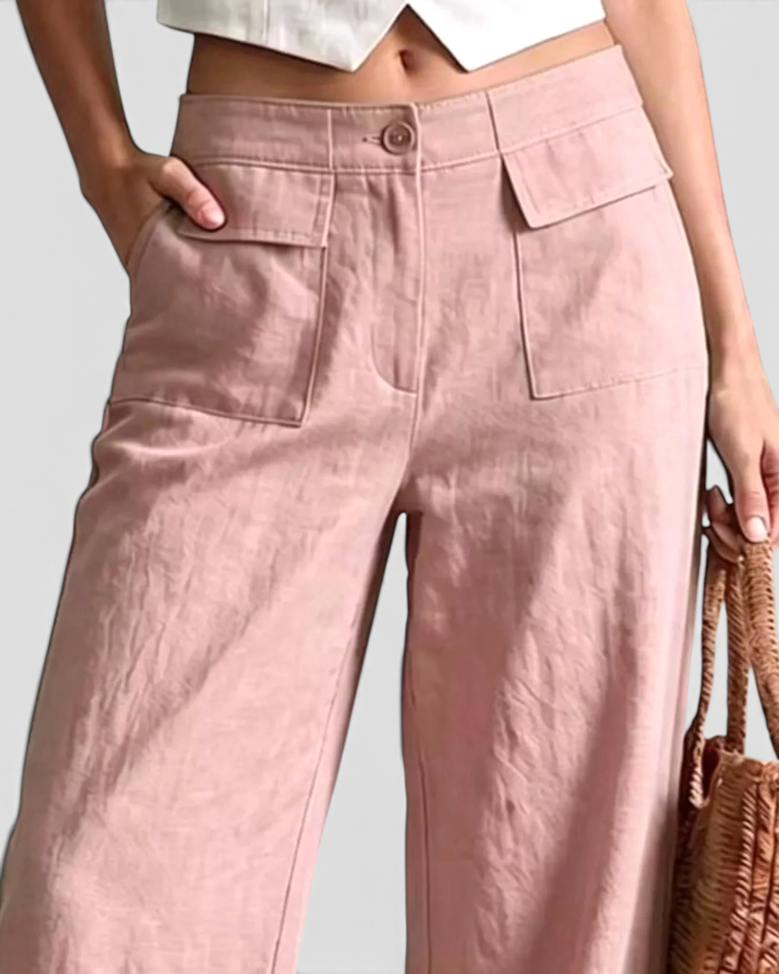 Beach Rose Co. dusty pink wide-leg cotton blend pants featuring oversized front flap pockets and a button closure.