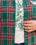 Beach Rose Co. green and red plaid shirt with gingham pocket detail worn over a graphic tee