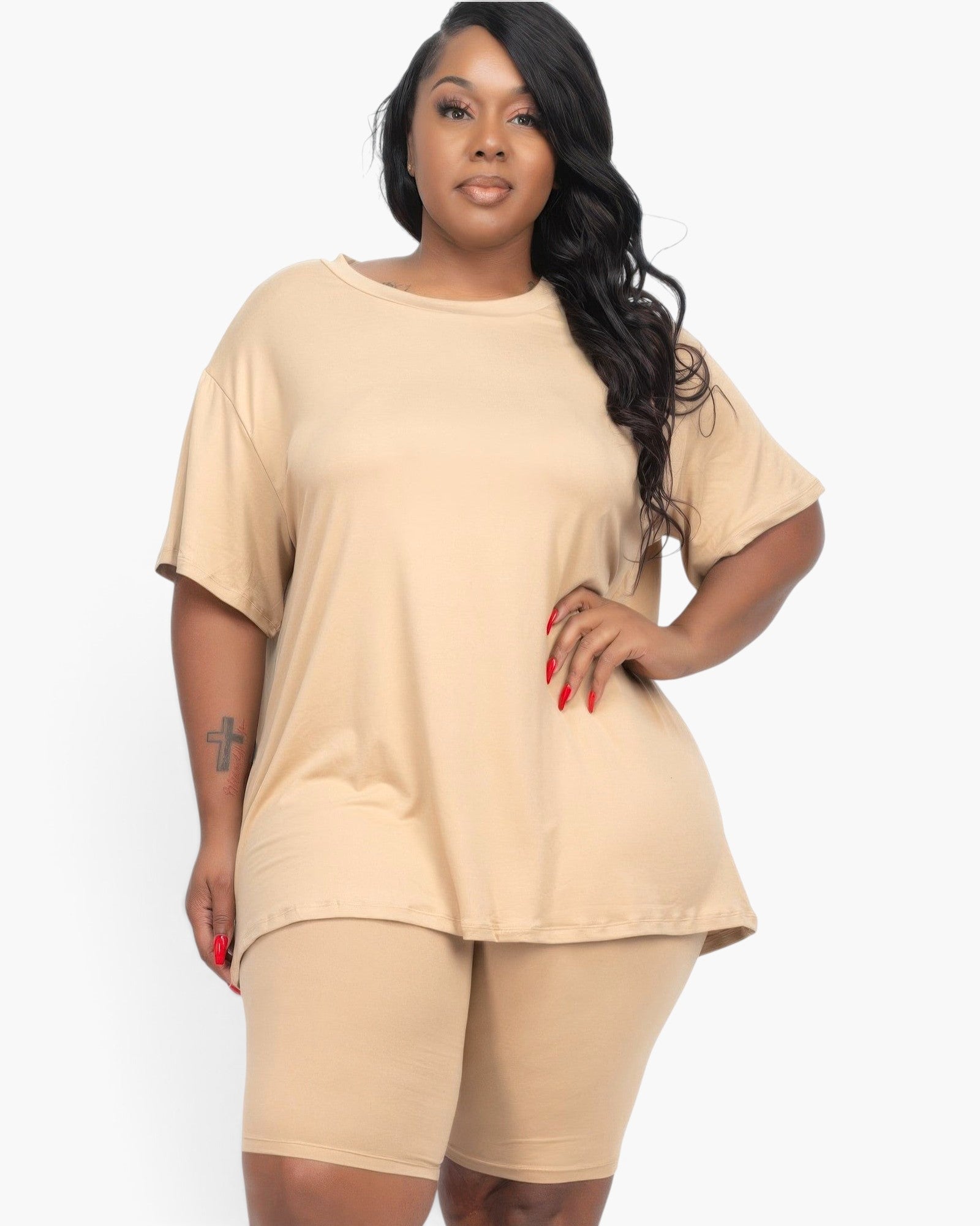 Beach Rose Co. plus size beige loose fit top and matching biker shorts set on a model with long dark wavy hair.