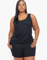 Beach Rose Co. plus size model wearing a black stretchy jersey tank top and matching shorts for a comfortable fit.