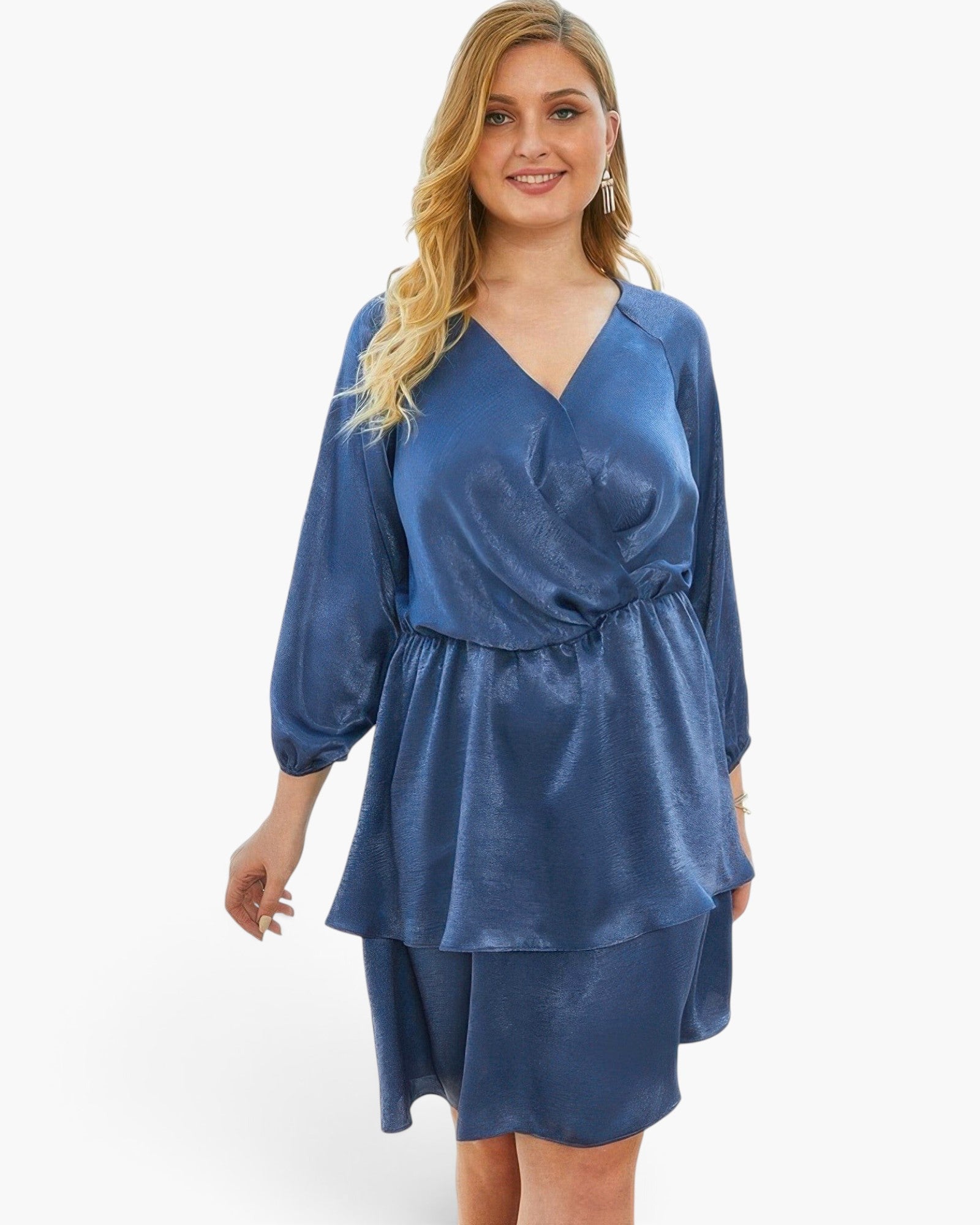 Beach Rose Co. plus size blue satin v-neck dress with long sleeves and a ruffled hem worn by a blonde model