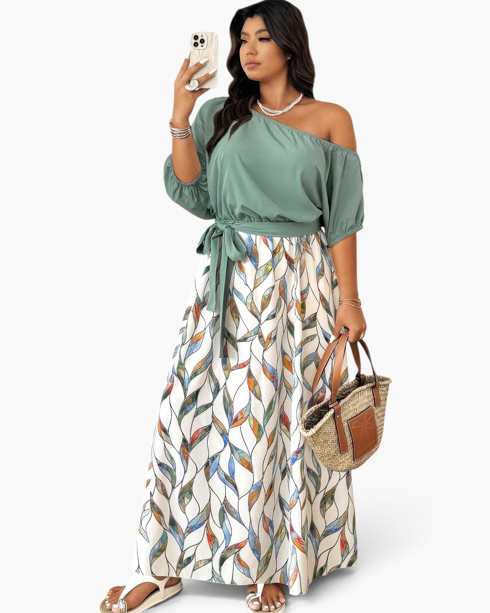 Beach Rose Co. plus size one-shoulder dress with a solid green top and a white skirt featuring a colorful leaf print.