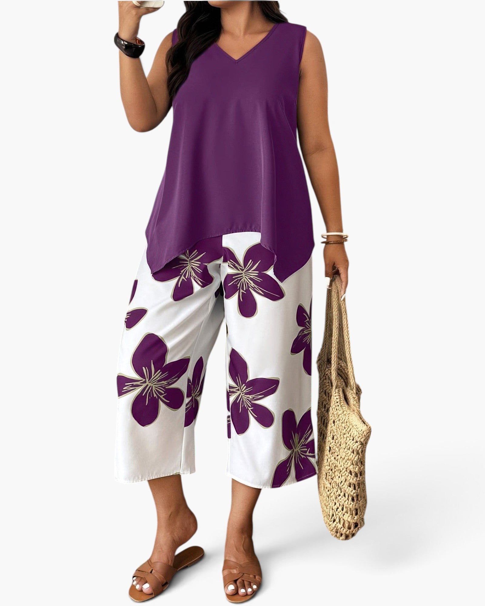 Beach Rose Co. plus size two-piece set featuring a purple sleeveless top and white floral patchwork cropped pants.