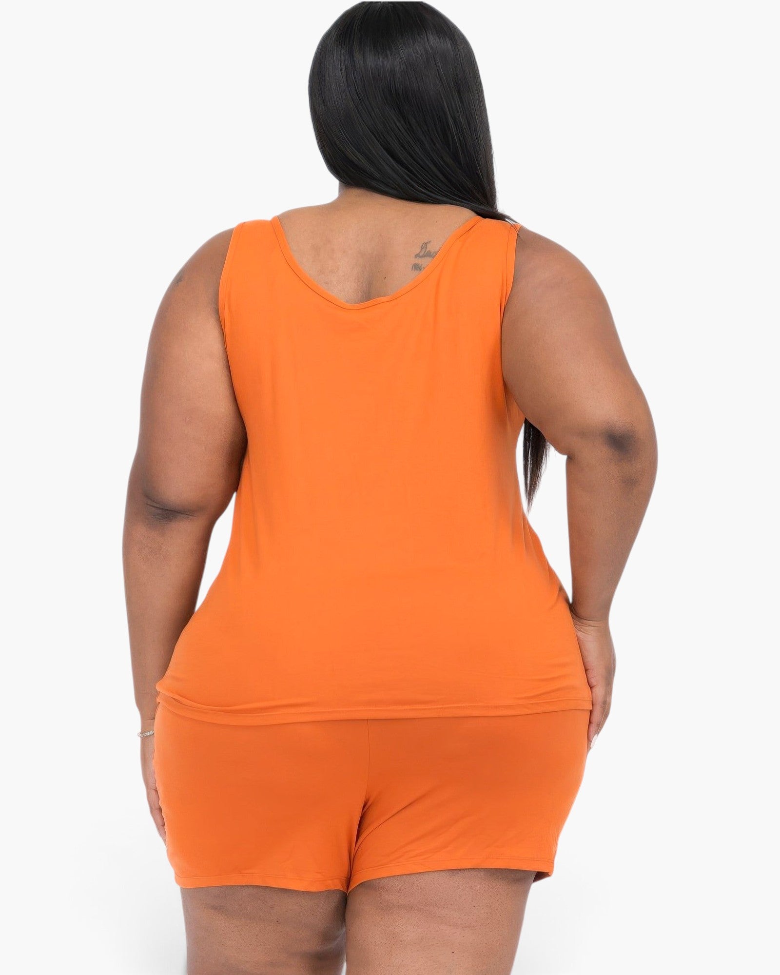 Beach Rose Co. plus size orange tank top and shorts lounge set on a model, back view showing relaxed fit jersey fabric.
