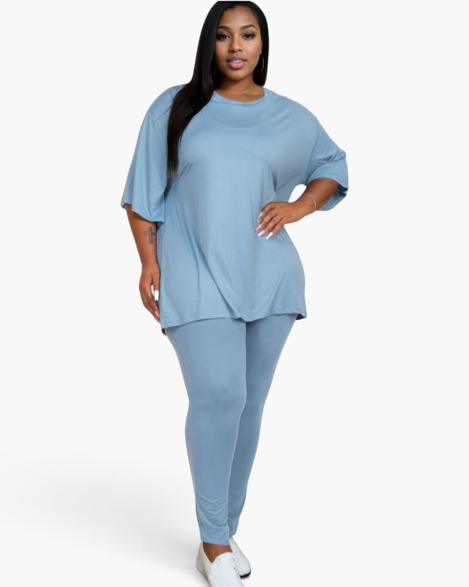 Beach Rose Co. plus size oversized t-shirt and leggings set in faded denim blue, worn by a model with white sneakers.