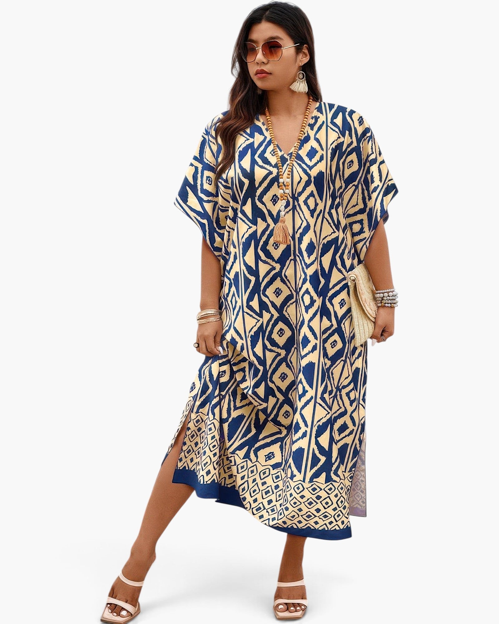 Beach Rose Co. plus size V-neck dress in blue and beige geometric print with side split, worn by a model with sunglasses.