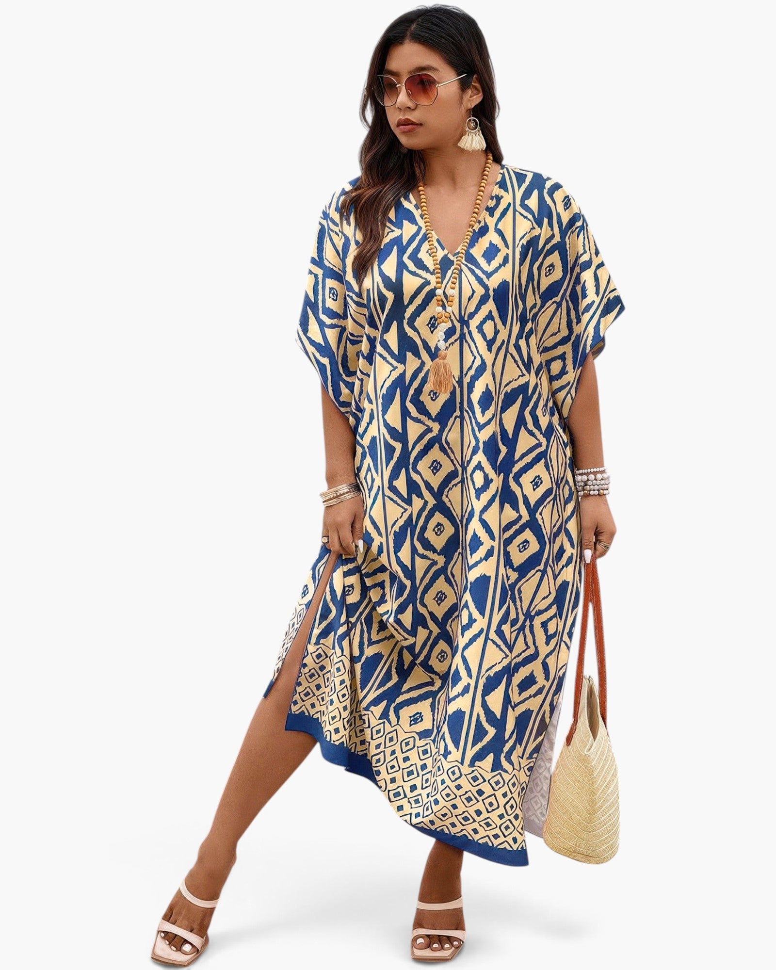 Beach Rose Co. plus size V-neck dress with blue and beige geometric print, side split, and relaxed flowy fit.