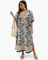 Beach Rose Co. plus size V-neck dress with blue and beige geometric print, side slits, and relaxed fit on a model.