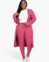 Beach Rose Co. plus size dark mauve ribbed long cardigan and leggings set worn by a model with a white crop top.