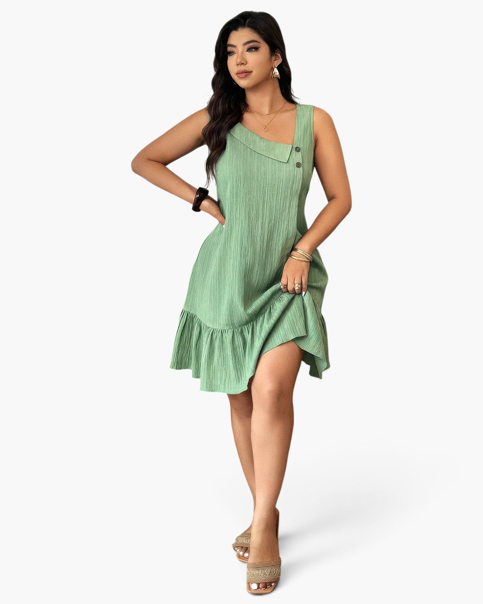 Beach Rose Co. plus size sage green textured dress with an irregular collar and ruffled hem worn by a model