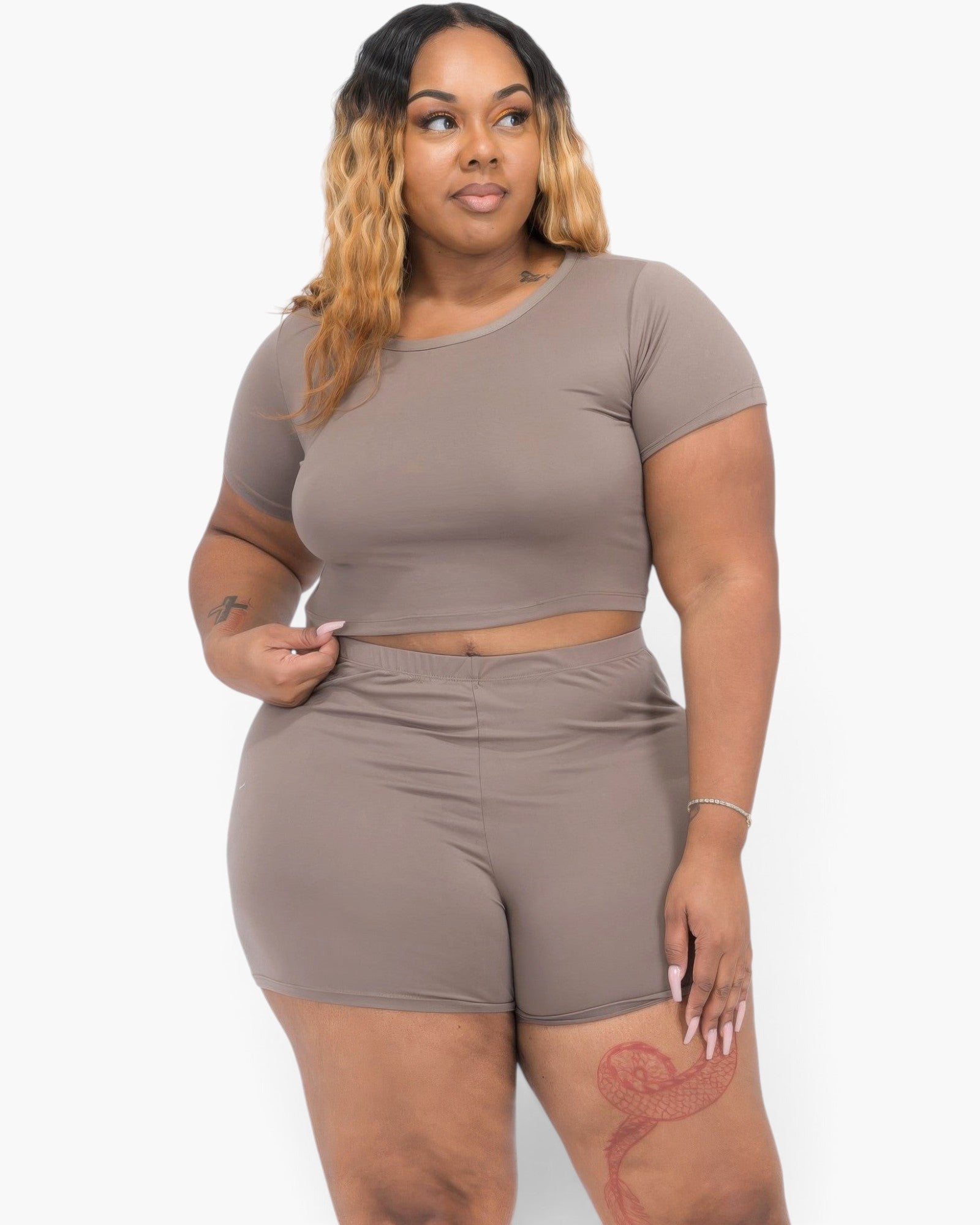Beach Rose Co. plus size taupe short sleeve crop top and shorts set worn by a model against a white background.