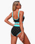Beach Rose Co. black polka-dot high-waisted bikini set with bright blue contrast trim and adjustable straps