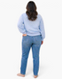 Beach Rose Co. plus size light blue pullover with white polka dots, long sleeves, and ribbed hem, back view.