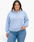 Beach Rose Co. plus-size light blue polyester pullover with white polka dots, snap-button neckline, and stand collar.