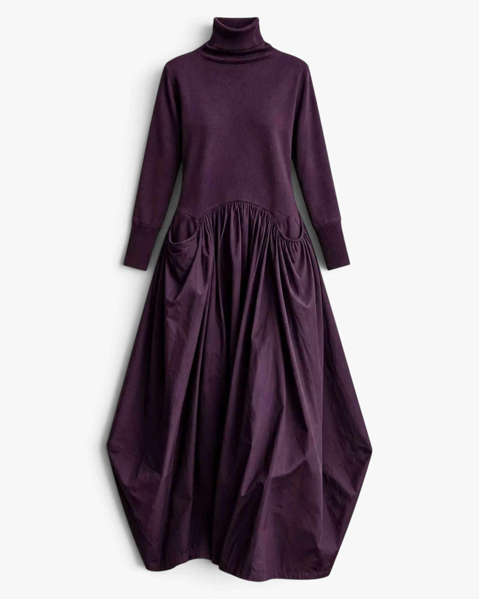 Beach Rose Co. dark purple maxi dress with a turtleneck, sweater bodice, gathered skirt, and sculptural balloon hem.