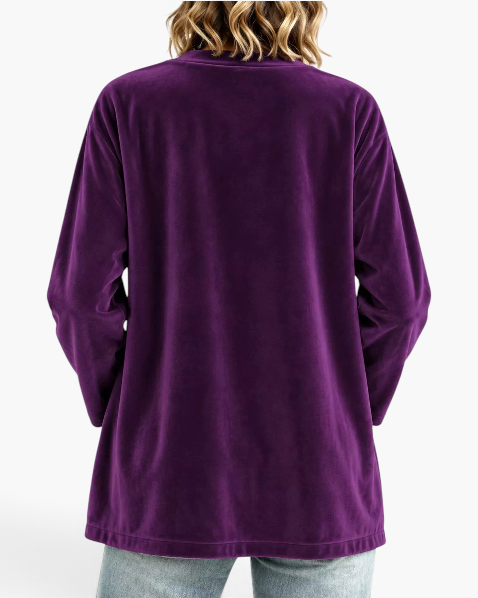 Beach Rose Co. purple velour cardigan with long sleeves and a relaxed fit, shown from the back on a model.
