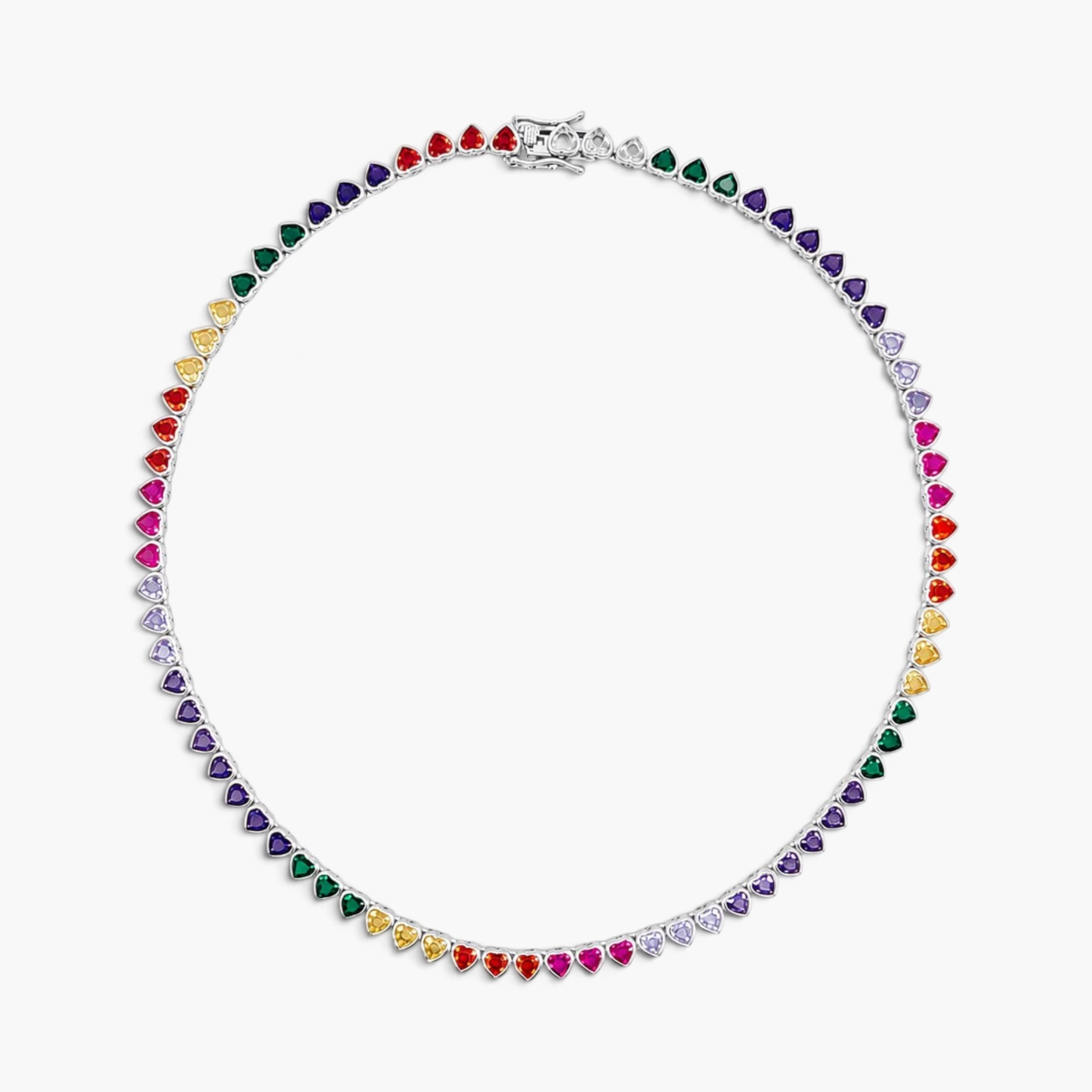 Beach Rose Co. rainbow heart-shaped cubic zirconia tennis necklace in rhodium finish on a white background.