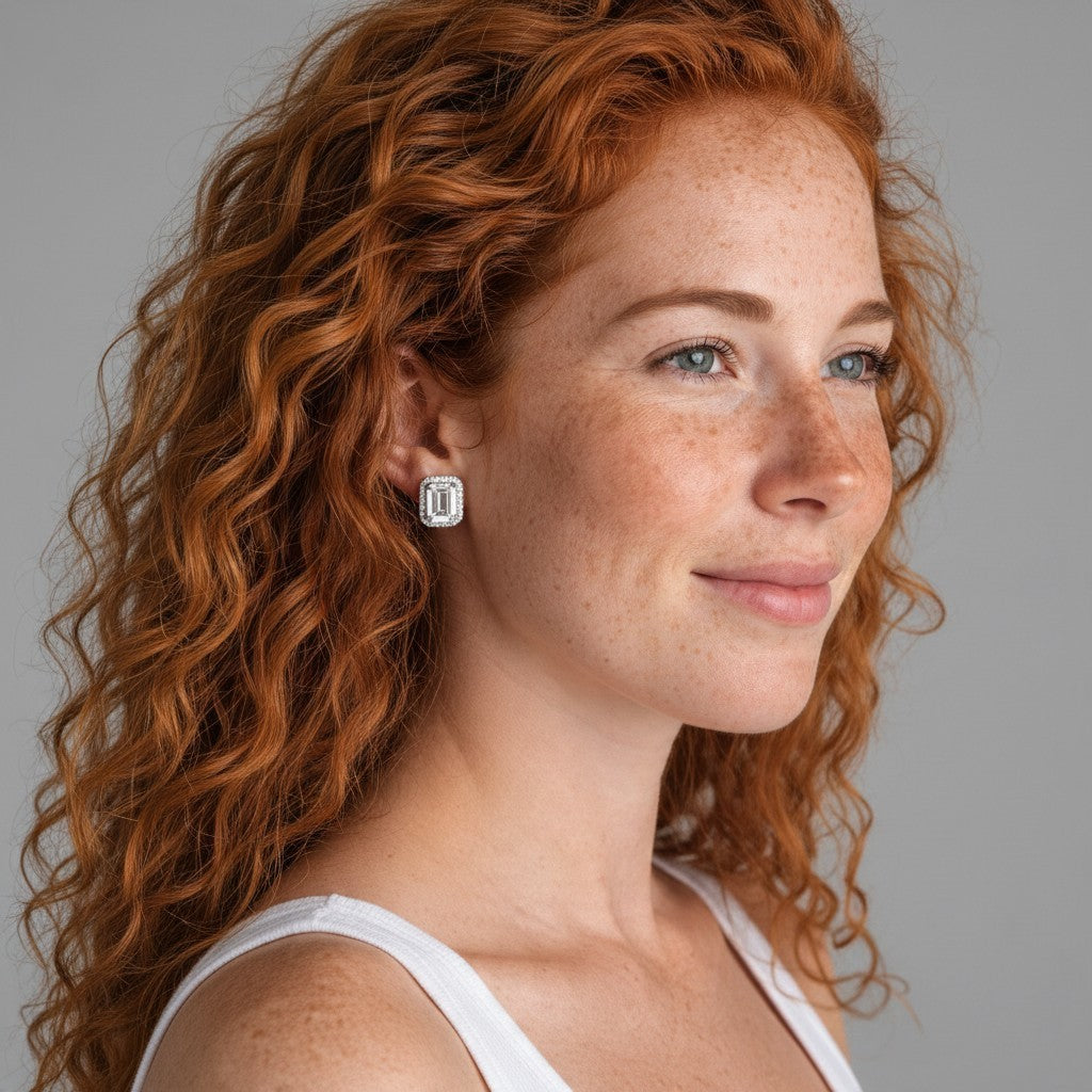 Beach Rose Co. rectangular moissanite halo stud earrings worn by a woman with long red curly hair